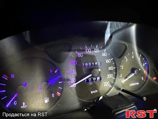 Красный Дэу Ланос, объемом двигателя 1.5 л и пробегом 290 тыс. км за 1950 $, фото 6 на Automoto.ua