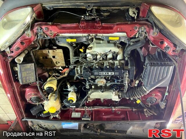 Червоний Деу Ланос, об'ємом двигуна 1.5 л та пробігом 126 тис. км за 1000 $, фото 5 на Automoto.ua