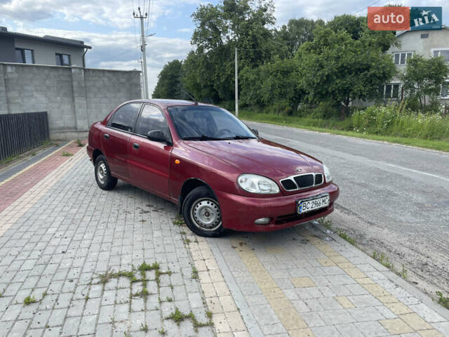 Красный Дэу Ланос, объемом двигателя 1.5 л и пробегом 250 тыс. км за 1150 $, фото 4 на Automoto.ua
