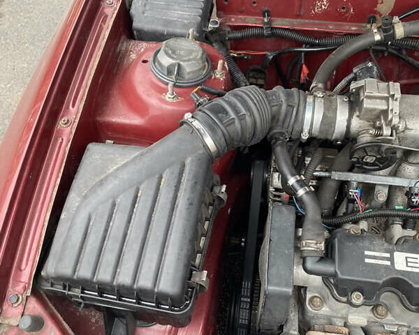 Красный Дэу Ланос, объемом двигателя 1.5 л и пробегом 250 тыс. км за 1450 $, фото 6 на Automoto.ua