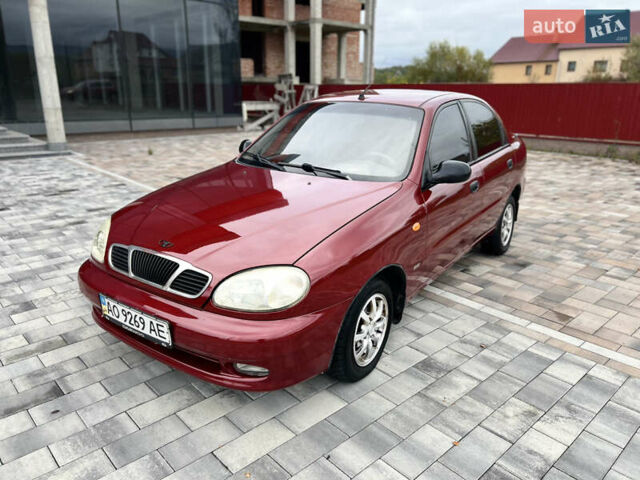 Красный Дэу Ланос, объемом двигателя 1.5 л и пробегом 250 тыс. км за 1950 $, фото 31 на Automoto.ua