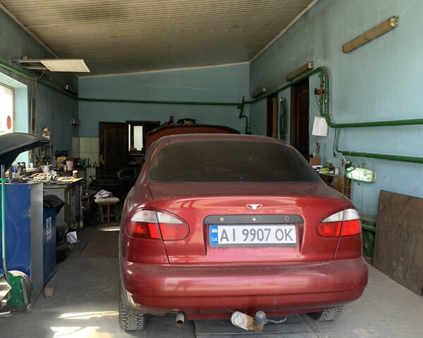 Красный Дэу Ланос, объемом двигателя 1.5 л и пробегом 348 тыс. км за 2000 $, фото 2 на Automoto.ua