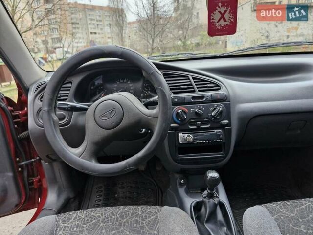 Красный Дэу Ланос, объемом двигателя 1.5 л и пробегом 146 тыс. км за 2300 $, фото 7 на Automoto.ua