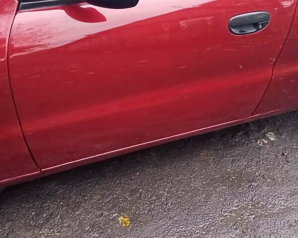 Червоний Деу Ланос, об'ємом двигуна 1.3 л та пробігом 220 тис. км за 1850 $, фото 14 на Automoto.ua