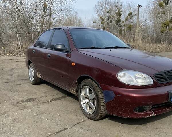 Червоний Деу Ланос, об'ємом двигуна 1.5 л та пробігом 238 тис. км за 1800 $, фото 1 на Automoto.ua