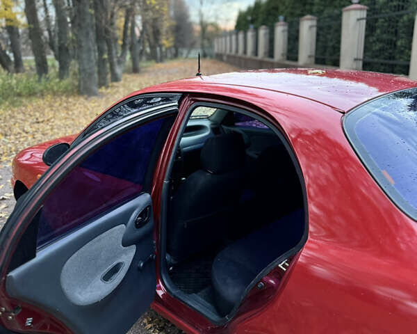Деу Ланос 2006 у Василькове на Automoto.ua Червоний Деу Ланос, об'ємом двигуна 1.5 л та пробігом 141 тис. км за 1700 $, фото 9 на Automoto.ua