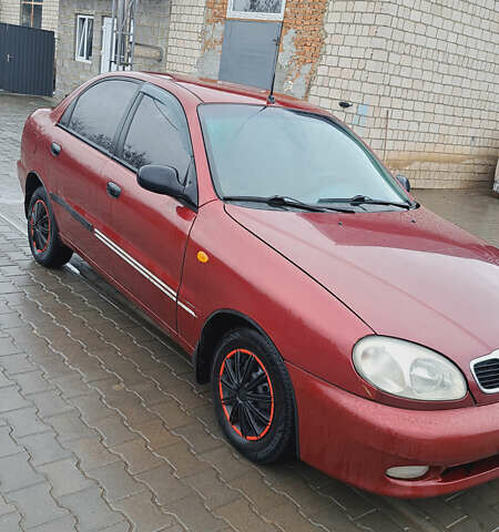 Красный Дэу Ланос, объемом двигателя 1.5 л и пробегом 153 тыс. км за 2000 $, фото 2 на Automoto.ua