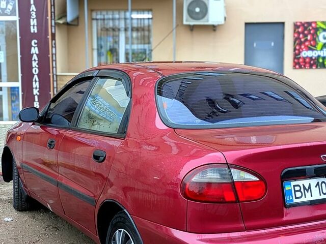 Червоний Деу Ланос, об'ємом двигуна 1.5 л та пробігом 313 тис. км за 2400 $, фото 2 на Automoto.ua