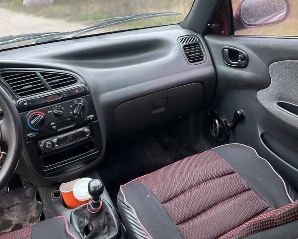 Красный Дэу Ланос, объемом двигателя 1.5 л и пробегом 210 тыс. км за 1700 $, фото 8 на Automoto.ua