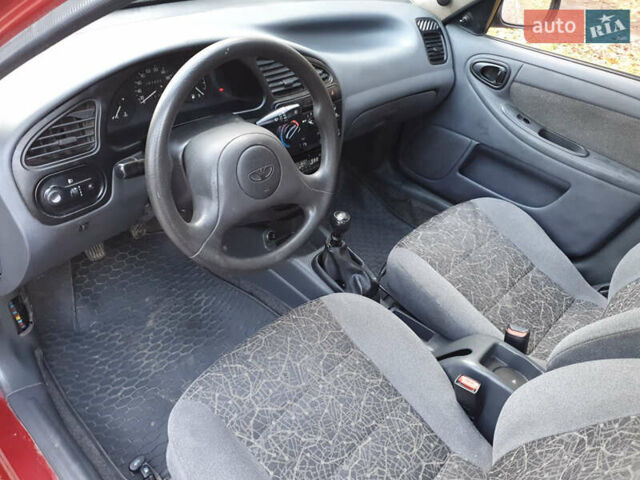 Красный Дэу Ланос, объемом двигателя 1.5 л и пробегом 270 тыс. км за 2450 $, фото 6 на Automoto.ua