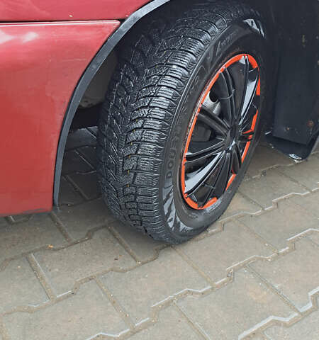 Красный Дэу Ланос, объемом двигателя 1.5 л и пробегом 153 тыс. км за 2000 $, фото 4 на Automoto.ua