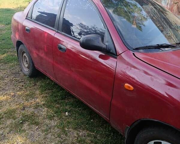 Червоний Деу Ланос, об'ємом двигуна 1.5 л та пробігом 266 тис. км за 1000 $, фото 1 на Automoto.ua