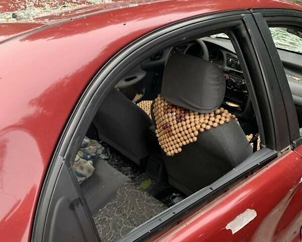 Красный Дэу Ланос, объемом двигателя 1.5 л и пробегом 120 тыс. км за 1600 $, фото 5 на Automoto.ua