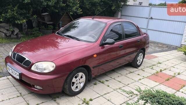 Красный Дэу Ланос, объемом двигателя 1.5 л и пробегом 128 тыс. км за 3550 $, фото 1 на Automoto.ua