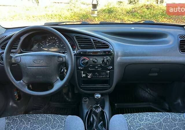 Красный Дэу Ланос, объемом двигателя 1.6 л и пробегом 216 тыс. км за 1900 $, фото 15 на Automoto.ua