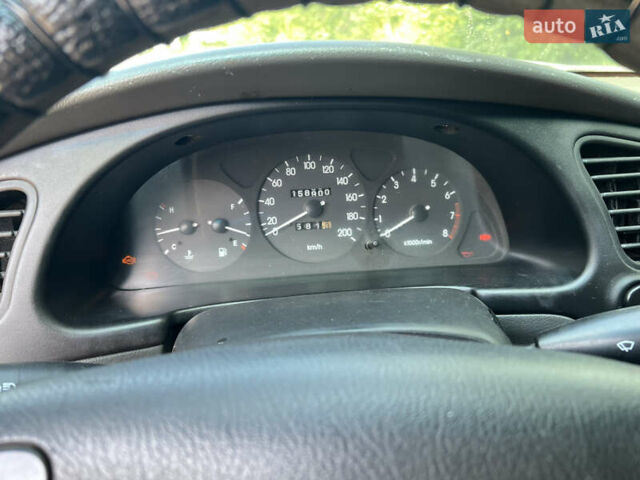 Красный Дэу Ланос, объемом двигателя 1.5 л и пробегом 158 тыс. км за 2500 $, фото 9 на Automoto.ua