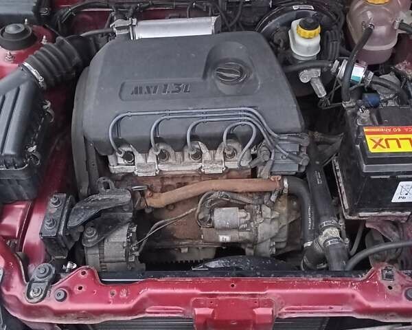 Червоний Деу Ланос, об'ємом двигуна 1.3 л та пробігом 220 тис. км за 1850 $, фото 45 на Automoto.ua