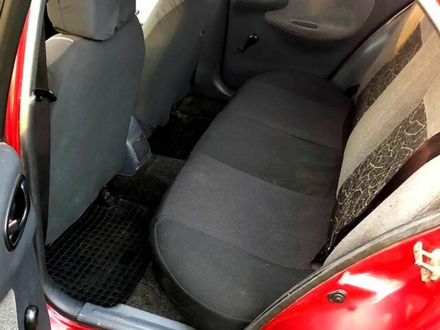 Красный Дэу Ланос, объемом двигателя 1.4 л и пробегом 0 тыс. км за 1350 $, фото 7 на Automoto.ua