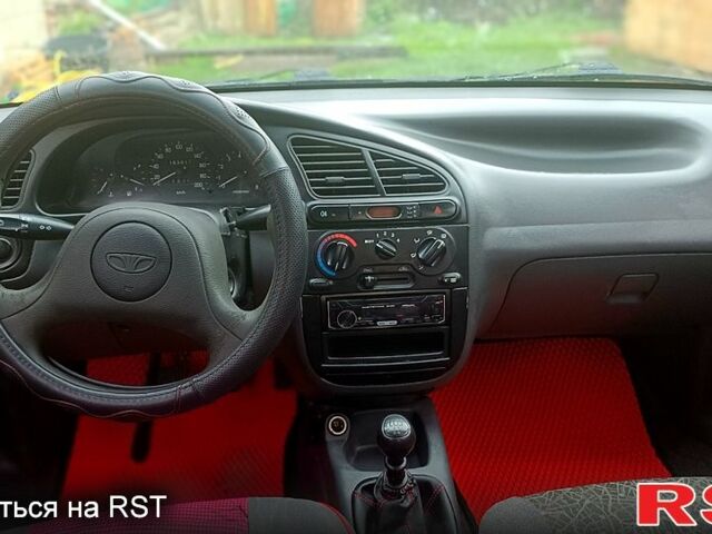 Красный Дэу Ланос, объемом двигателя 1.5 л и пробегом 163 тыс. км за 2200 $, фото 3 на Automoto.ua