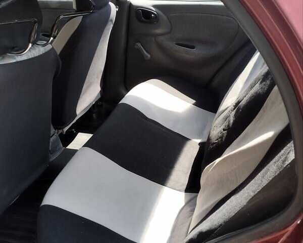 Красный Дэу Ланос, объемом двигателя 1.5 л и пробегом 255 тыс. км за 2200 $, фото 5 на Automoto.ua