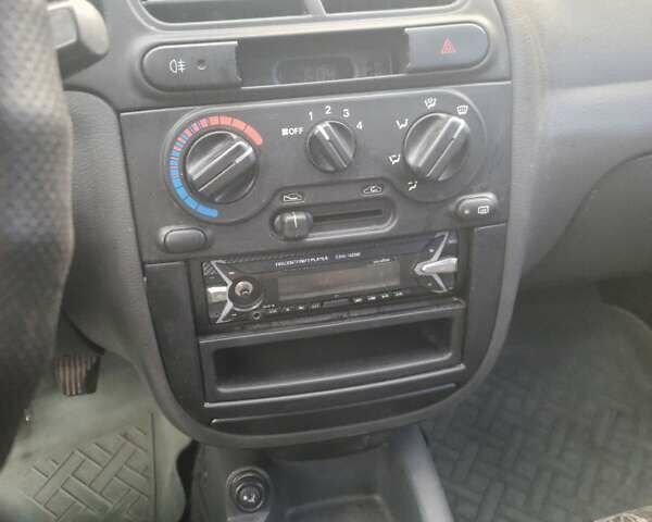 Червоний Деу Ланос, об'ємом двигуна 1.5 л та пробігом 224 тис. км за 1400 $, фото 11 на Automoto.ua