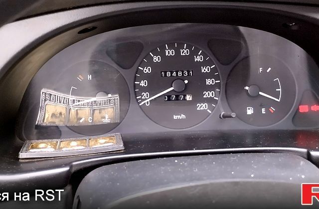 Красный Дэу Ланос, объемом двигателя 1.5 л и пробегом 185 тыс. км за 1400 $, фото 3 на Automoto.ua