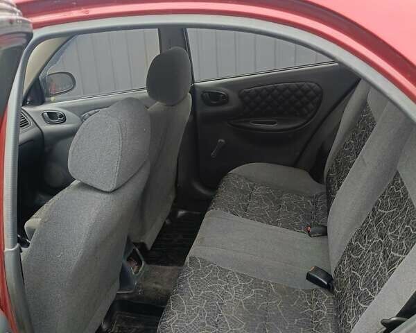 Деу Ланос 2007 у Краматорске на Automoto.ua Червоний Деу Ланос, об'ємом двигуна 1.6 л та пробігом 318 тис. км за 2500 $, фото 3 на Automoto.ua