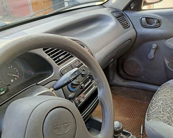 Червоний Деу Ланос, об'ємом двигуна 1.5 л та пробігом 268 тис. км за 1950 $, фото 1 на Automoto.ua