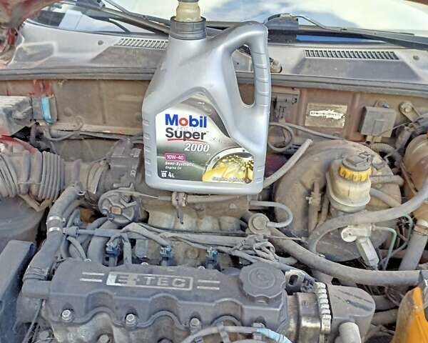 Червоний Деу Ланос, об'ємом двигуна 1.5 л та пробігом 268 тис. км за 1950 $, фото 16 на Automoto.ua