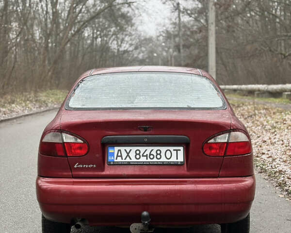 Красный Дэу Ланос, объемом двигателя 1.6 л и пробегом 235 тыс. км за 2150 $, фото 4 на Automoto.ua
