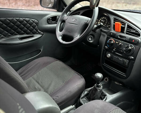 Красный Дэу Ланос, объемом двигателя 1.6 л и пробегом 235 тыс. км за 2150 $, фото 12 на Automoto.ua