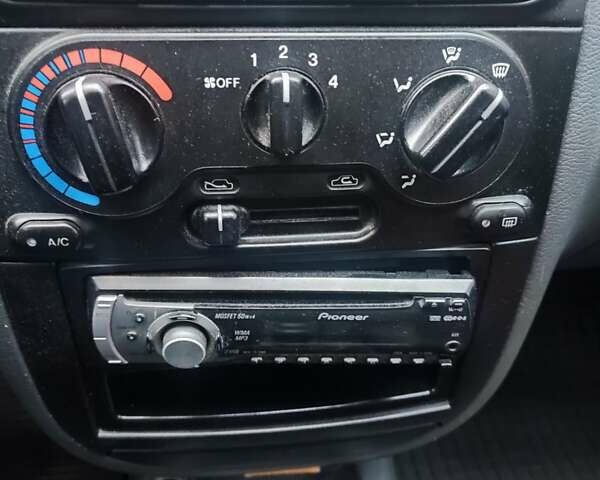 Красный Дэу Ланос, объемом двигателя 1.5 л и пробегом 120 тыс. км за 2900 $, фото 6 на Automoto.ua