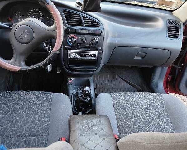 Червоний Деу Ланос, об'ємом двигуна 1.5 л та пробігом 102 тис. км за 2350 $, фото 10 на Automoto.ua