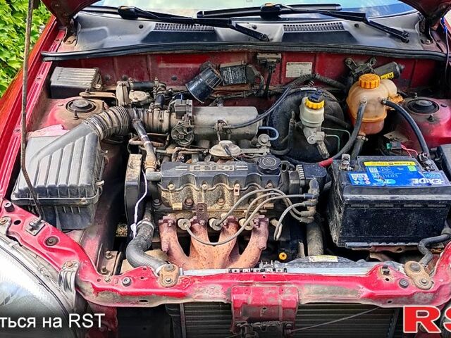 Червоний Деу Ланос, об'ємом двигуна 1.5 л та пробігом 350 тис. км за 1200 $, фото 5 на Automoto.ua