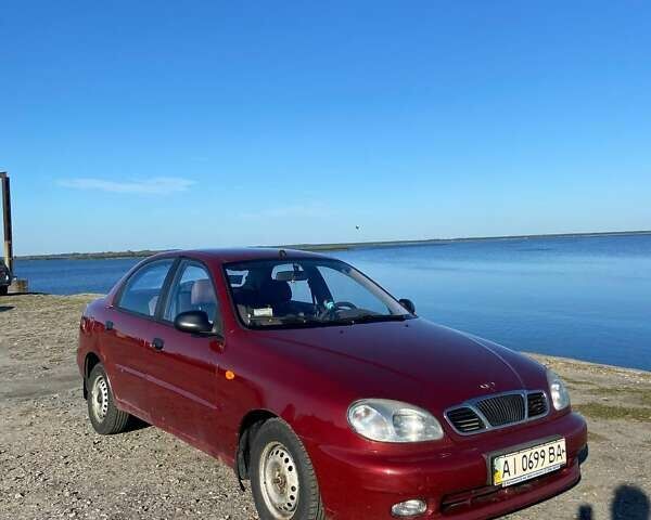 Красный Дэу Ланос, объемом двигателя 1.5 л и пробегом 209 тыс. км за 2500 $, фото 1 на Automoto.ua