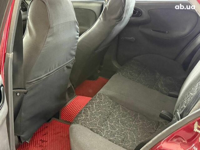 Красный Дэу Ланос, объемом двигателя 1.5 л и пробегом 305 тыс. км за 2440 $, фото 9 на Automoto.ua