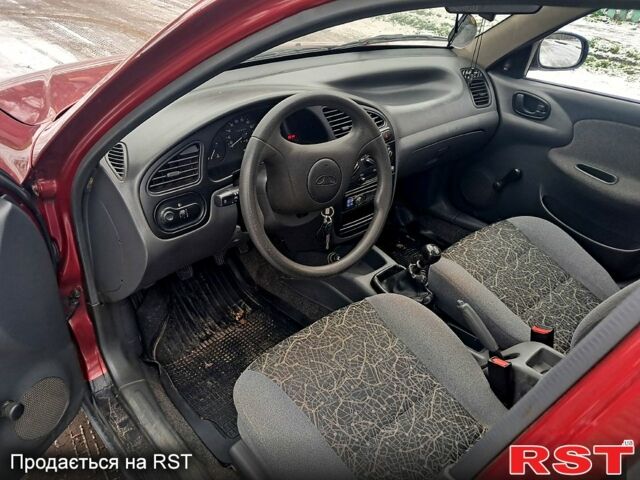 Красный Дэу Ланос, объемом двигателя 1.5 л и пробегом 220 тыс. км за 2100 $, фото 7 на Automoto.ua