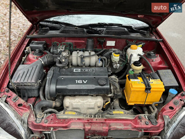 Красный Дэу Ланос, объемом двигателя 1.6 л и пробегом 235 тыс. км за 2150 $, фото 14 на Automoto.ua