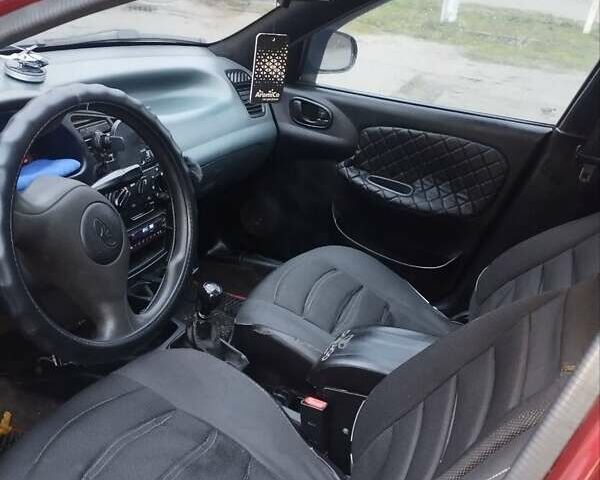 Червоний Деу Ланос, об'ємом двигуна 1.5 л та пробігом 250 тис. км за 1800 $, фото 4 на Automoto.ua