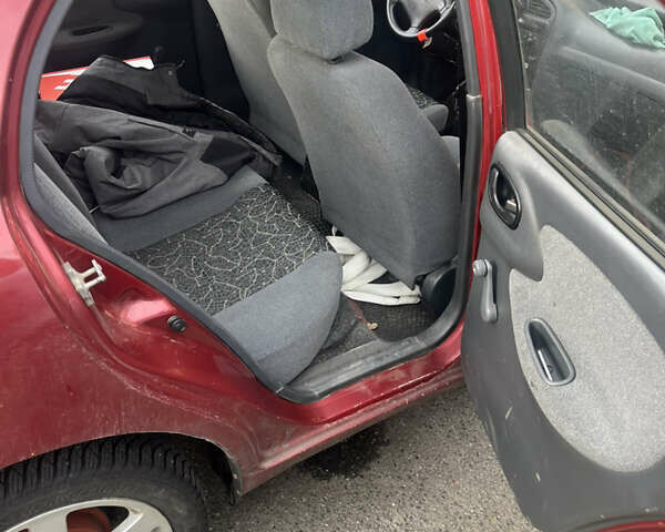 Деу Ланос 2007 у Черкасах на Automoto.ua Червоний Деу Ланос, об'ємом двигуна 1.6 л та пробігом 311 тис. км за 2575 $, фото 12 на Automoto.ua