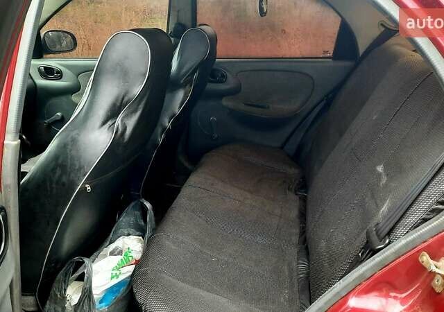 Червоний Деу Ланос, об'ємом двигуна 1.5 л та пробігом 135 тис. км за 2900 $, фото 4 на Automoto.ua