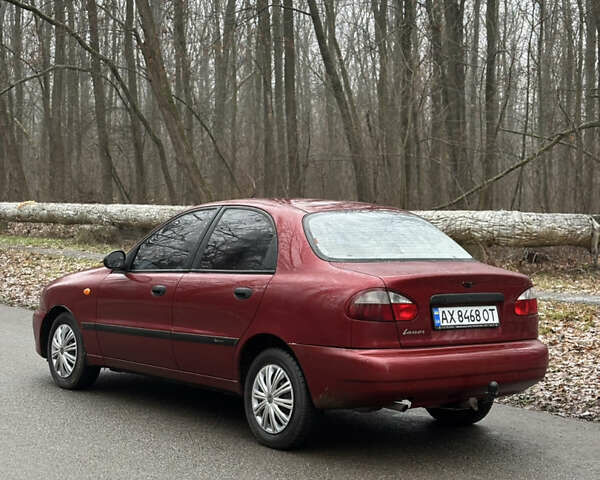 Красный Дэу Ланос, объемом двигателя 1.6 л и пробегом 235 тыс. км за 2150 $, фото 5 на Automoto.ua