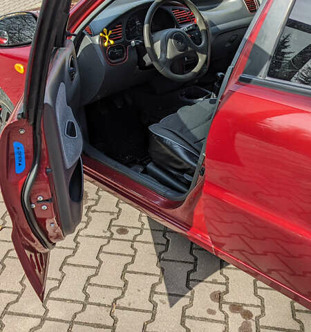 Красный Дэу Ланос, объемом двигателя 1.5 л и пробегом 135 тыс. км за 2200 $, фото 5 на Automoto.ua