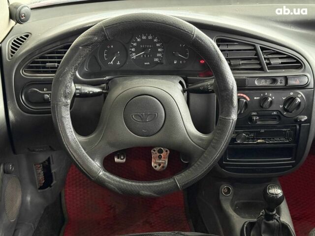 Красный Дэу Ланос, объемом двигателя 1.5 л и пробегом 305 тыс. км за 2440 $, фото 13 на Automoto.ua