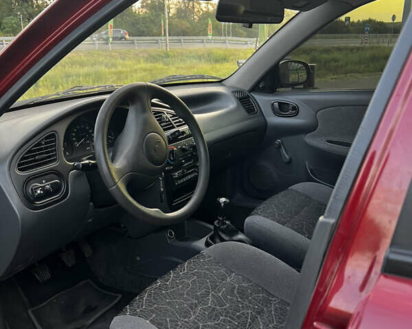 Красный Дэу Ланос, объемом двигателя 1.5 л и пробегом 175 тыс. км за 2200 $, фото 11 на Automoto.ua