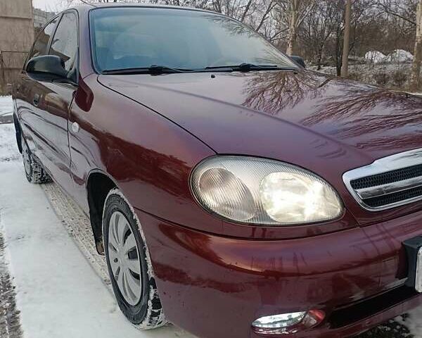 Красный Дэу Ланос, объемом двигателя 1.5 л и пробегом 200 тыс. км за 2650 $, фото 3 на Automoto.ua