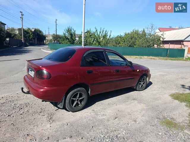 Красный Дэу Ланос, объемом двигателя 1.5 л и пробегом 330 тыс. км за 2550 $, фото 3 на Automoto.ua