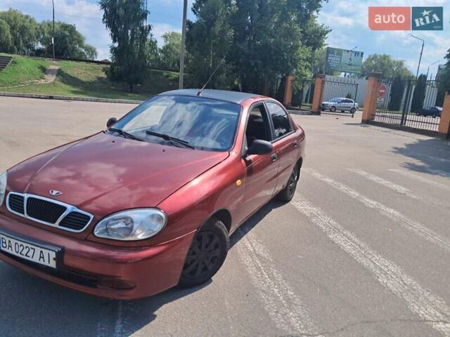Красный Дэу Ланос, объемом двигателя 1.5 л и пробегом 270 тыс. км за 2100 $, фото 3 на Automoto.ua