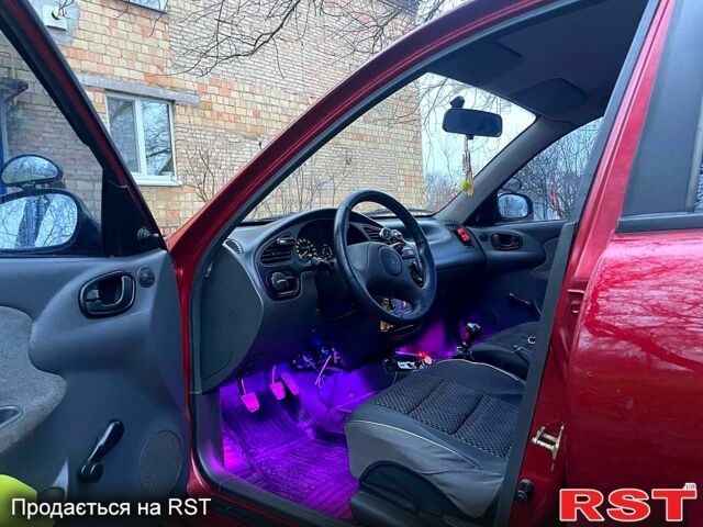 Червоний Деу Ланос, об'ємом двигуна 1.5 л та пробігом 193 тис. км за 2600 $, фото 6 на Automoto.ua