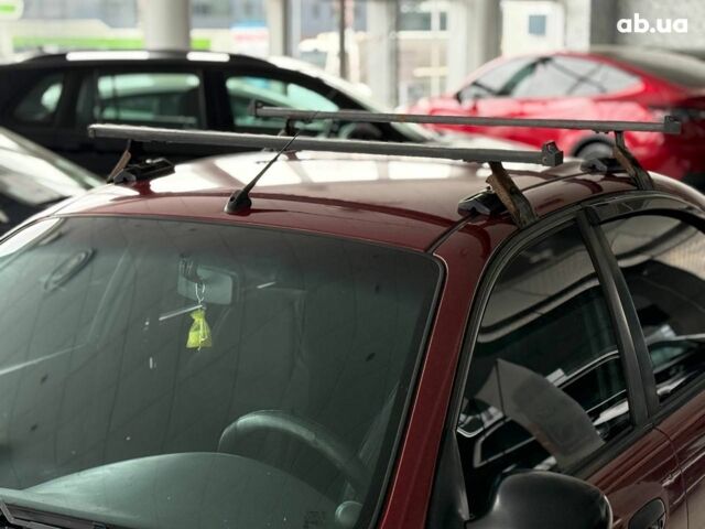 Красный Дэу Ланос, объемом двигателя 1.5 л и пробегом 305 тыс. км за 2440 $, фото 10 на Automoto.ua